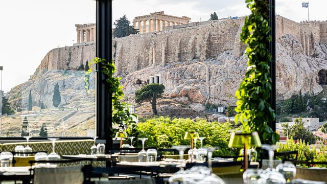 Rooftop SENSE Restaurant with Acropolis view: premium venue for VIP receptions and executive dinners.