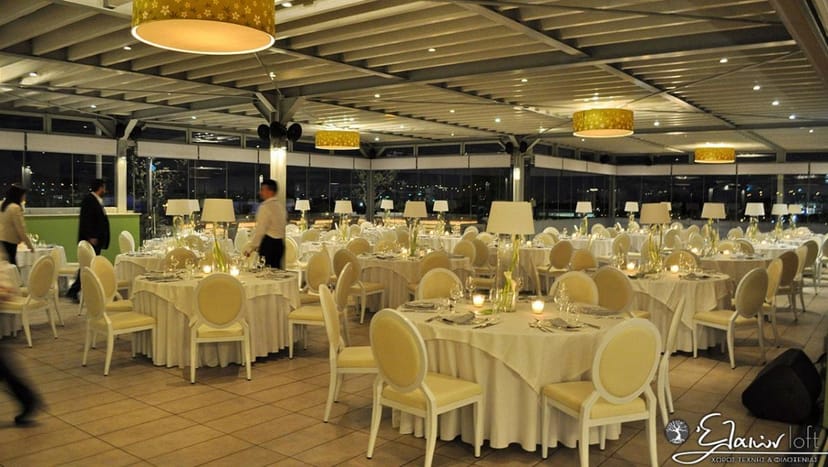 Elegant wedding gala dinner at Eleon Loft featuring neutral decor and spacious banquet seating.