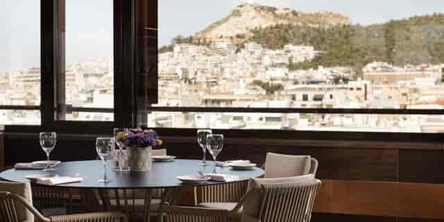 Rooftop terrace at Crowne Plaza Athens, ideal for VIP dinners and intimate corporate board retreats.
