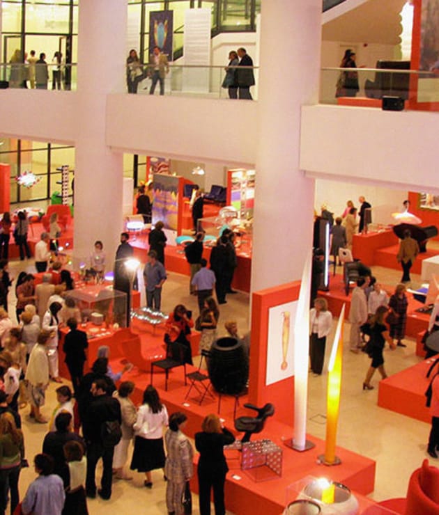 Dimitris Mitropoulos Hall trade show with tiered staging, exhibition event venue.