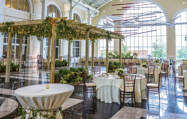 The Classic Center Athena Lobby: elegant indoor garden wedding or event ballroom setup.
