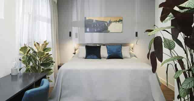 Signature Suite with workspace at The Gem Society Boutique Hotel for corporate business travel.