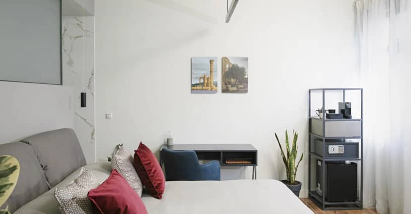Modern Signature Suite with workspace for corporate hotel events and business travel.