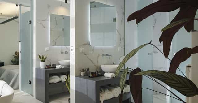 Luxury Signature Suite hotel bathroom, VIP guest experience, premium venue accommodation.