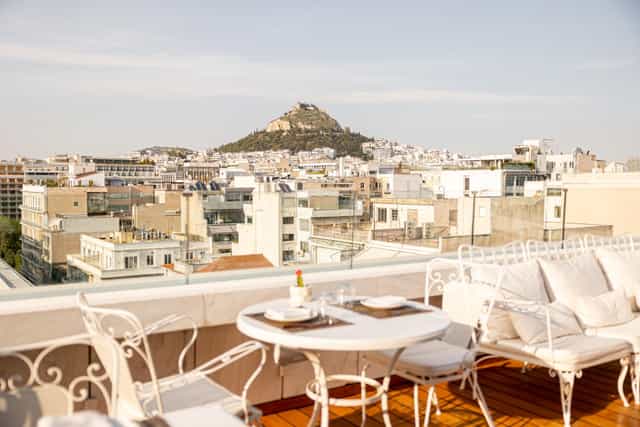 Rooftop restaurant in Athens with Mount Lycabettus view for VIP reception and corporate lunch.