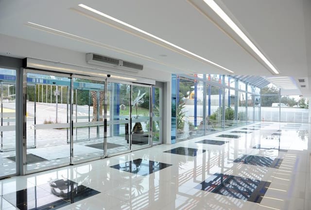 Modern MEC Mediterranean Exhibition Center foyer, ideal for trade show registration and events.