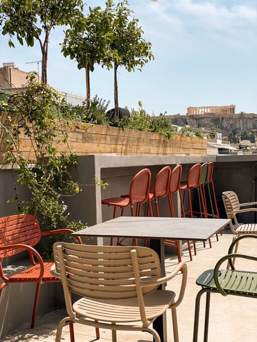 Rooftop bar in Athens with iconic views, perfect for corporate mixers and networking events.