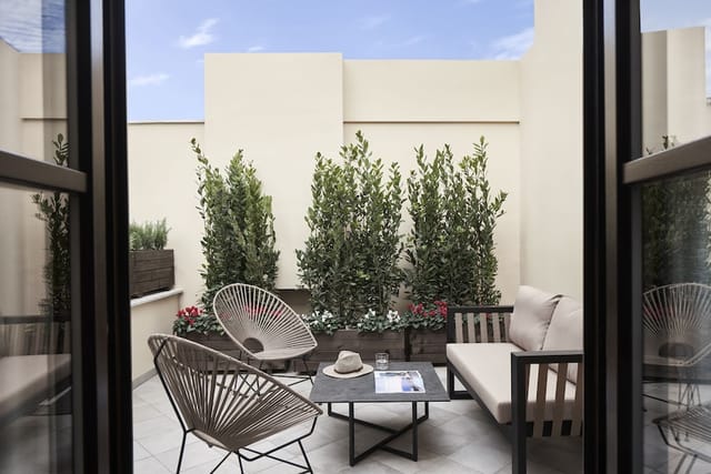 VIP meeting space in NLH Monastiraki, versatile high-end outdoor breakout area for corporate events.