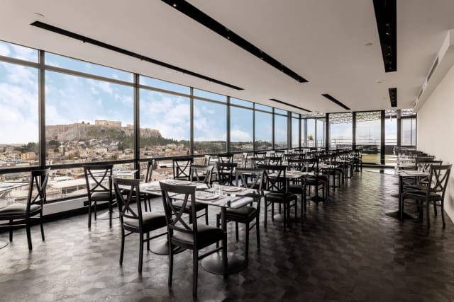 Astor Hotel rooftop with Acropolis view, ideal for VIP dining and executive luncheons.