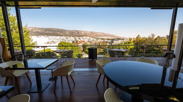 Hytra Restaurant bar with panoramic city views, ideal for corporate dinners and networking events.