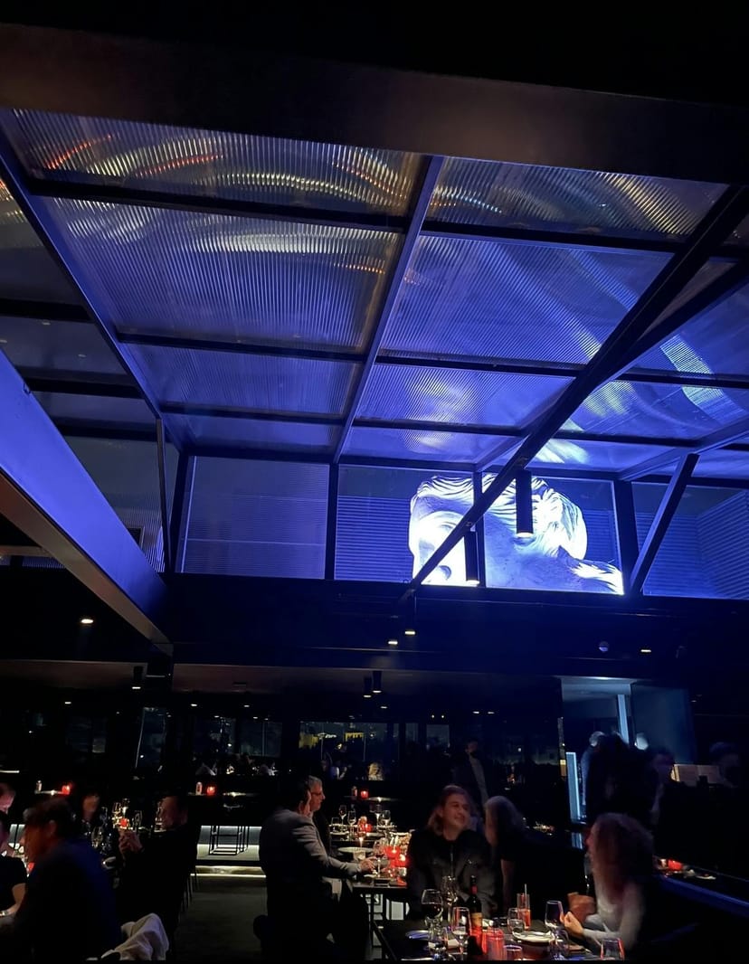 Privilege Penthouse event venue with mood lighting for corporate mixers and networking dinners.