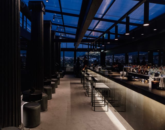 Luxury rooftop cocktail bar for corporate events and VIP networking receptions.