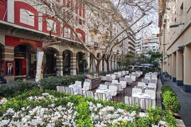 Outdoor banquet space at Athenee Athens for corporate events and gala dinners.