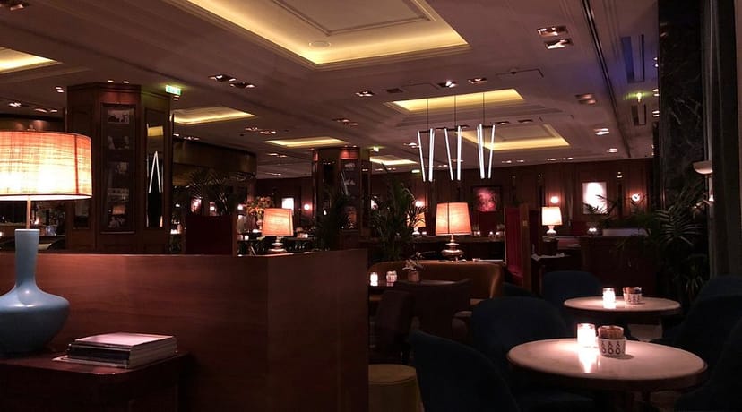 Upscale Athenee Athens hotel bar for professional networking and executive cocktail events.