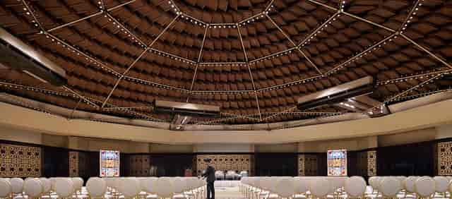 Buraidah Hall ballroom with architectural ceiling for corporate summits and keynote presentations.