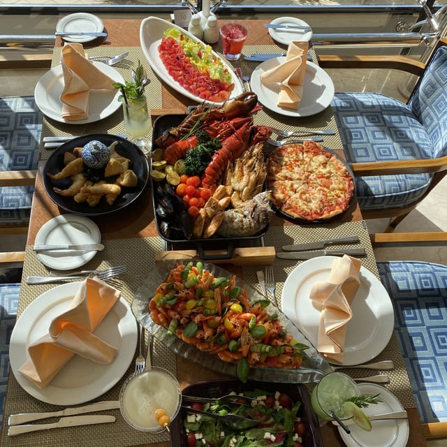 Al Bustan catering spread at InterContinental Riyadh featuring fresh seafood for corporate events.