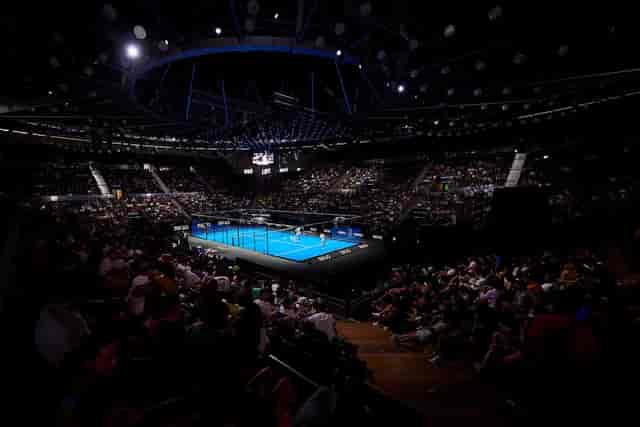 VIP lounge at The Arena Riyadh with circular staging and theatrical lighting for corporate events.