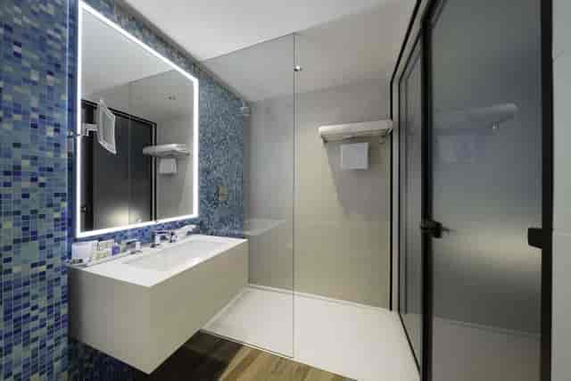 Modern Misan Meeting Room bathroom in Radisson Blu Riyadh, luxury executive event space.