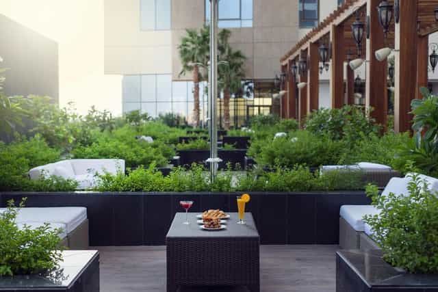Outdoor lounge at Mövenpick Riyadh, modular seating for networking and corporate events.
