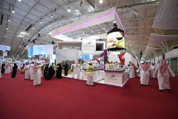 Trade show booth at Riyadh Exhibition Hall 2 with LED signage for corporate events and conferences.