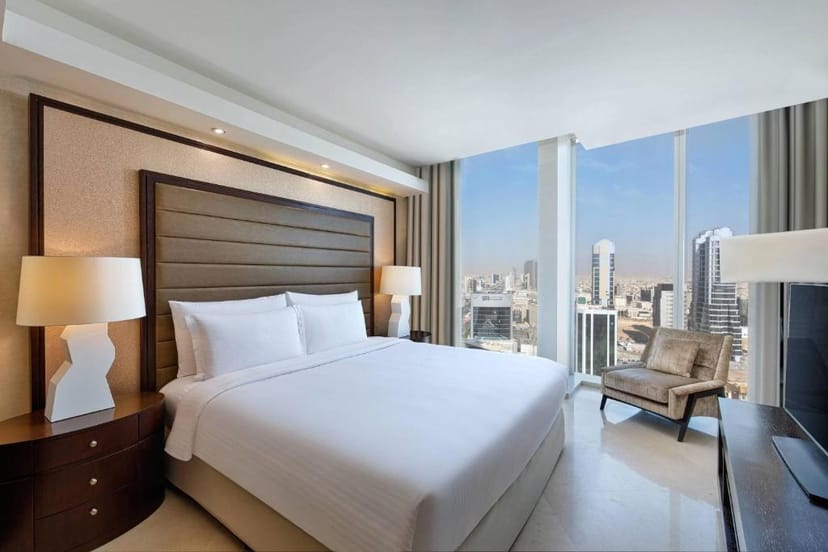 Premium JW Marriott Riyadh meeting room with city views for VIP corporate events and conferences.