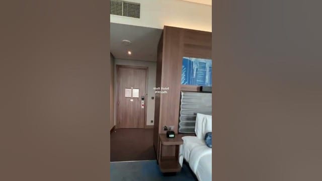 Modern suite at Aloft Riyadh hotel for business travel and corporate accommodation.