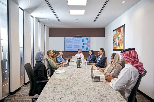 Executive boardroom in Roshn Business Front with AV system for corporate strategy meetings.