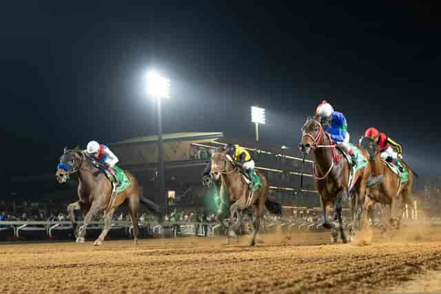Al Thuraya Trackside Restaurant at night: premium hospitality venue for horse racing events.