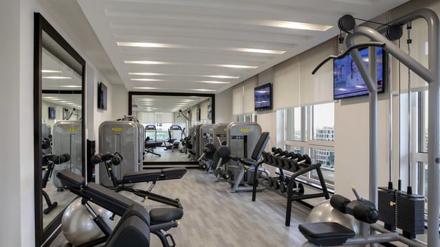 Modern fitness center at Centro Olaya for corporate wellness and incentive travel events.