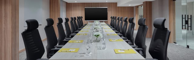 Executive boardroom at Crowne Plaza Riyadh Palace, featuring ergonomic seating for corporate meetings.
