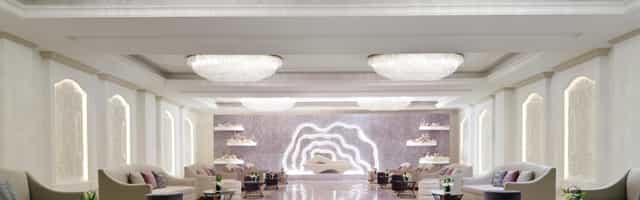 Al Jawhara Ballroom 2 with tiered chandeliers for luxury social events and VIP breakout sessions.