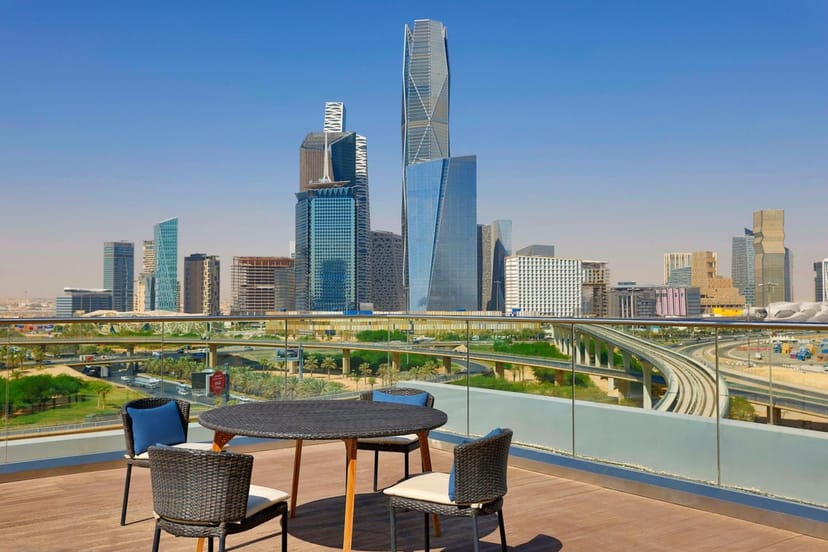 Modern meeting room with skyline view for VIP receptions and corporate events.