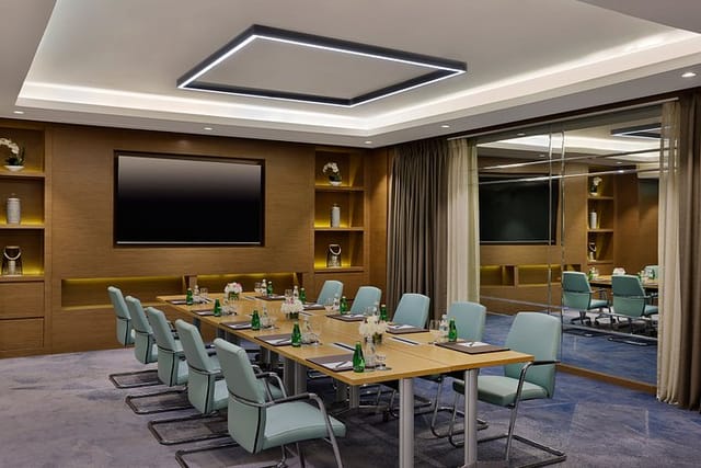 Executive boardroom in Courtyard Riyadh for professional business meetings and corporate events.