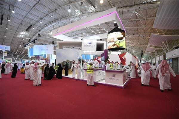 Multi-level trade show booth in Riyadh Exhibition Hall for industry event and business conference.