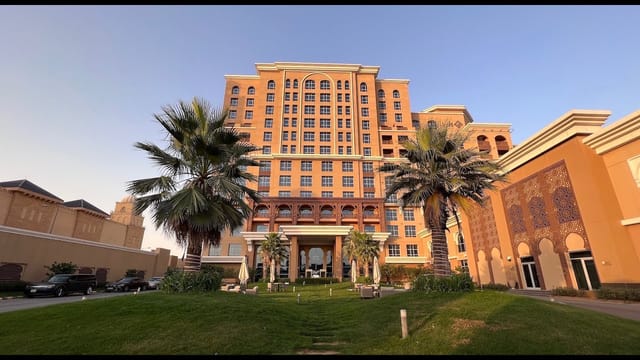 Luxury Neom resort in Riyadh with grand exterior, perfect for executive retreats and events.