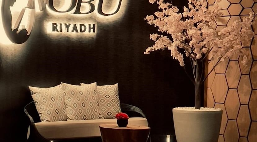 Minimalist VIP lounge at Nobu Hotel Riyadh featuring elegant lighting for luxury corporate events.