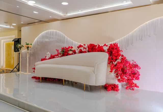 Liali Al Sharq Hall wedding stage with floral backdrop for gala and bridal events.