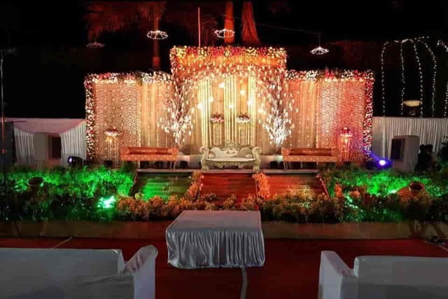 Lotus Restaurant banquet hall stage with floral decor for gala dinner or corporate event.