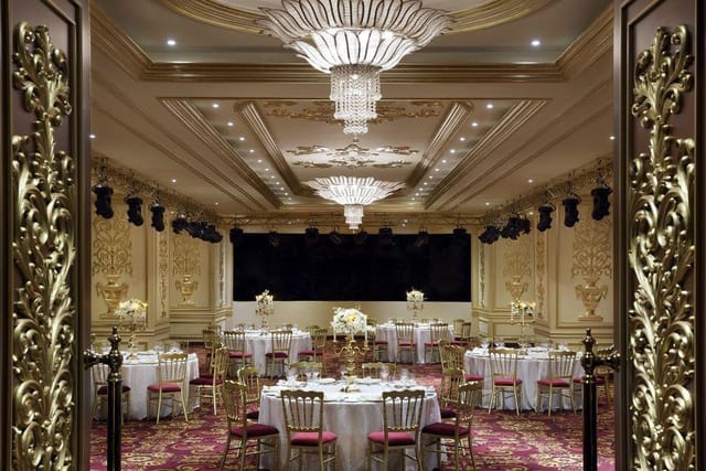 Shams Ballroom at Mövenpick Jeddah: Luxury gala and wedding venue with grand crystal chandeliers.