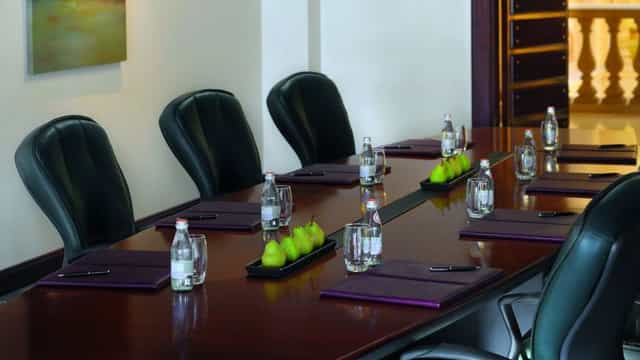 Jeddah Meeting Room with boardroom setup for executive corporate events and business conferences.