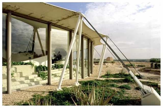 Tuwaiq Palace glass hall with fabric roof for luxury corporate retreats and boutique events.