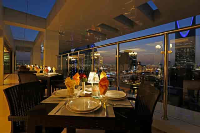 Rooftop restaurant at Canton Hotel for upscale corporate networking and VIP dinner events.