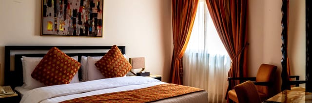 Upscale hotel guest room at Palacio Vivienda Turki Al Awal for business conference accommodation.