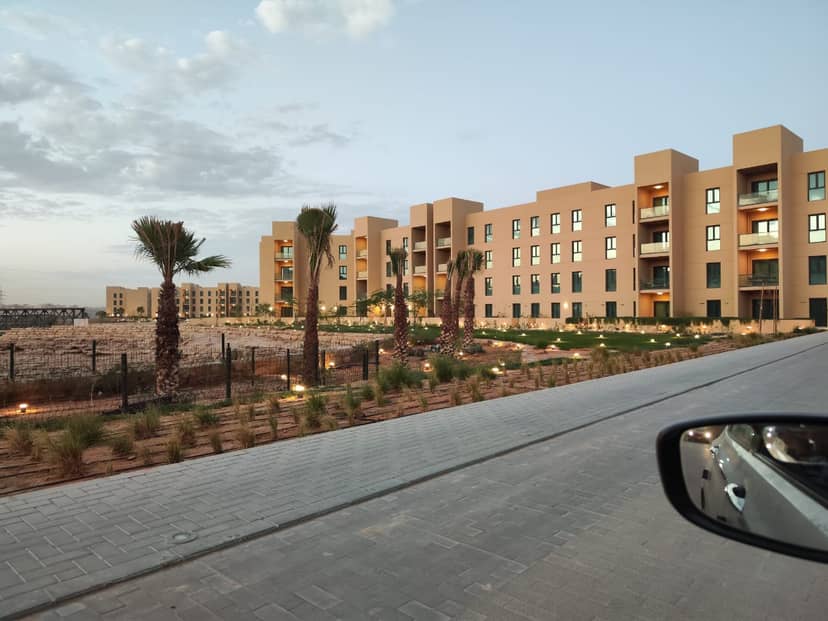 Modern villas in Wadi Al Hada at dusk, ideal for corporate retreats and off-site meetings.