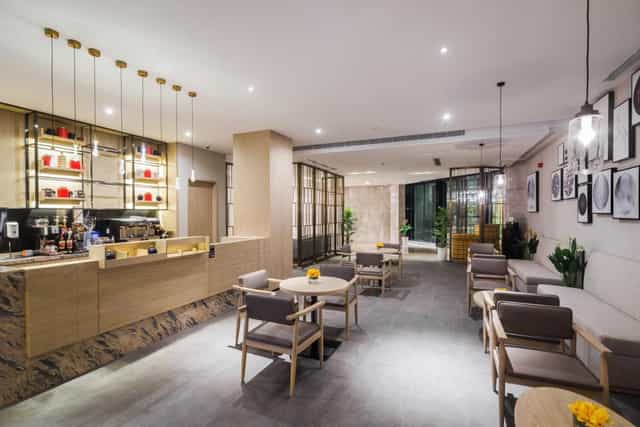 Modern meeting rooms with versatile pre-function space for corporate events and networking.
