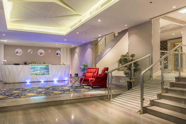 Al Takhasussi Hall lobby with reception area, ideal for corporate event check-ins and networking.