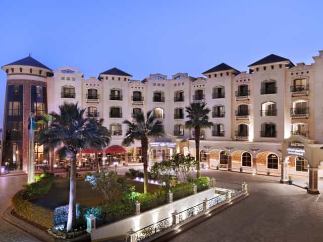 Mediterranean-style Al Takhasussi Palace boardroom, ideal for executive retreats and meetings.