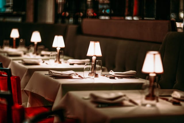 Luxury VIP dinner setup with ambient lighting for exclusive private events in Riyadh.