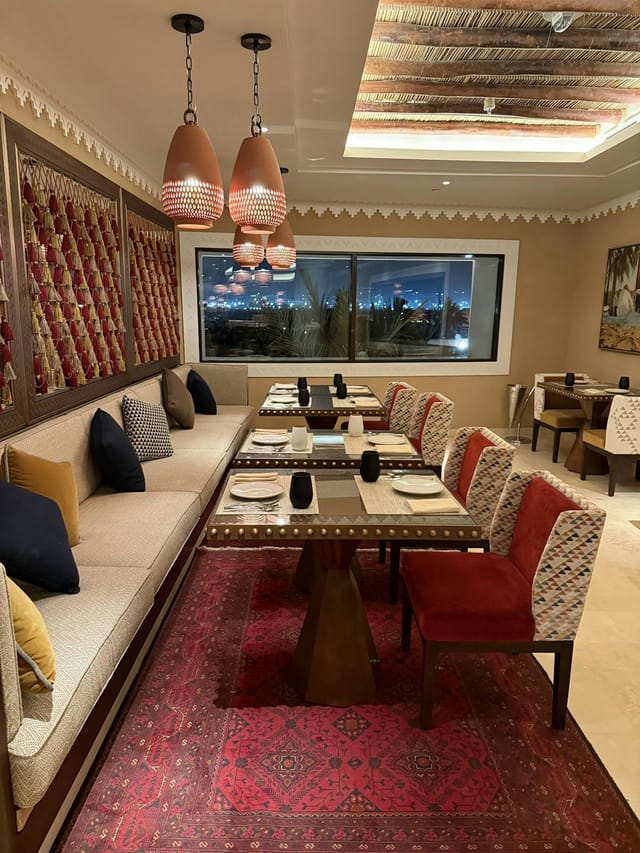 Taleed by Michael Mina: Luxury VIP dinner setup with night views for upscale private events.