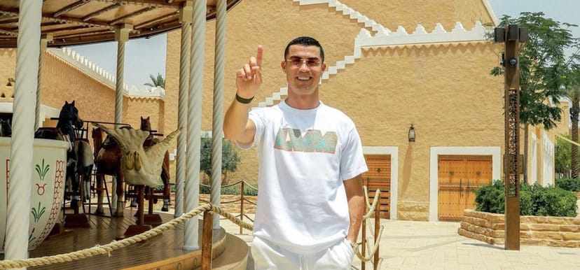 Influencer at TATEL Riyadh branded outdoor venue for experiential marketing event.